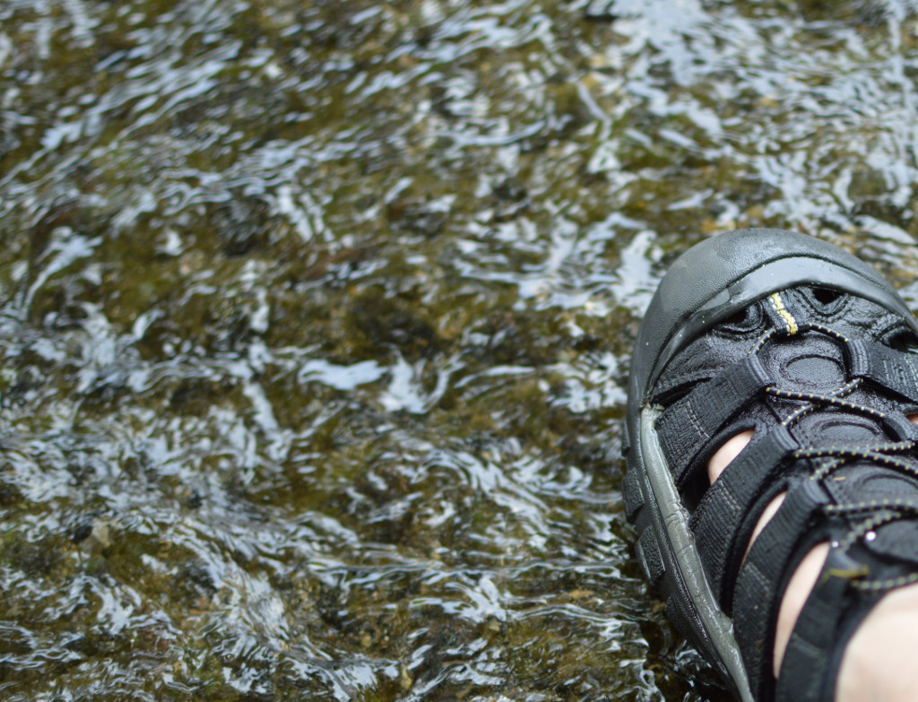 Feet in water to cool off in the summer heat