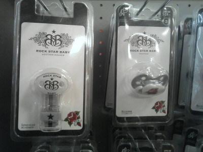 Bon Jovi Rock star dummies for babies. Really. These are real.